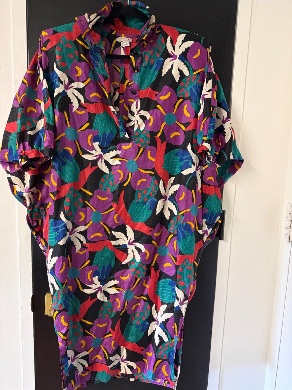 Basha silk kaftan dress. This piece is highlighted by its bold, 1980s-multicolor